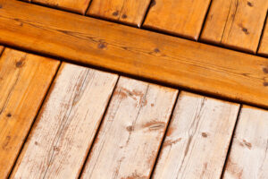 Wooden deck pattern partially stained Corrales NM